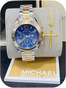 Michael Kors wristwatch paired with a gold cross pendant necklace