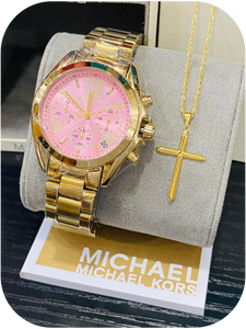 Michael Kors wristwatch paired with a gold cross pendant necklace